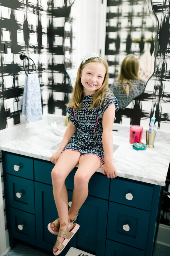 Caroline and Carson's Daily Style... Fall Fashion 2019 Edition by popular Nashville fashion blog, Hello Happiness: image of a little girl wearing a Nordstrom Little Wanderer Print Romper, Nordstrom Cosmic Sandal, and Nordstrom Metallic Headband.