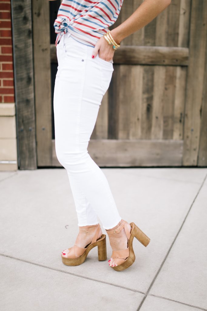 Happy Valentine's Day featured by top US life and style blog Hello! Happiness; Image of a woman wearing an Evereve striped shirt, Evereve white skinny jeans and Steve Madden sandals.