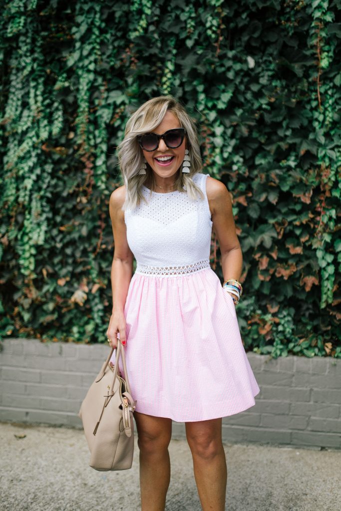 The Lilly Pulitzer After Party Sale is LIVE! by popular Nashville fashion blog, Hello Happiness: image of a woman wearing a Lilly Pulitzer Alivia Dress and NERO GIARDINI sneakers.