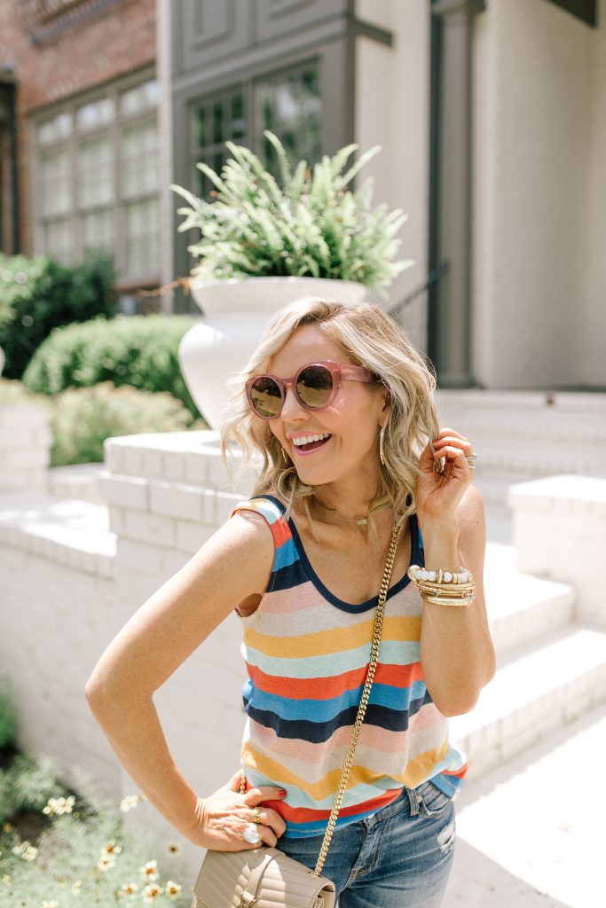 Evereve Summer Collection featured by top US fashion blog Hello! Happiness; Image of a woman wearing Evereve striped tank and Evereve jeans.