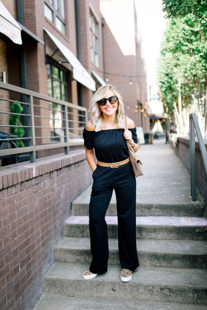 Independence Day Deals by popular Nashville life and style blog, Hello Happiness: image of Natasha Stoneking wearing a Gibson Look Off the Shoulder Ponte jumpsuit. 