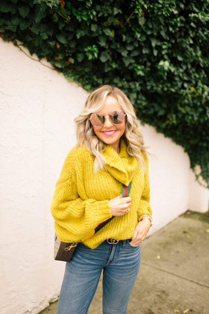 Anthropologie Sale by popular Nashville life and style blog, Hello Happiness: image of Natasha Stoneking wearing a Anthropologie cowl neck sweater, Big Love sunglasses, and Gucci messenger bag. 