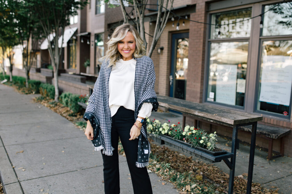 J. Crew Holiday by popular Nashville fashion blog, Hello Happiness: image of Natasha Stoneking standing outside and wearing a J. Crew double sided scarf, Ruffle Sleeve Top Satin Top in Crepe, Hayden Kick Out Crop Pant in Wool, Double Sided Scarf in Houndstooth Dot, and Green Embossed Leather Pumps.