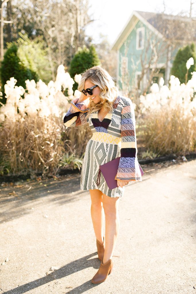Cute Spring Dresses featured by top US fashion blog Hello! Happiness; Image of a woman wearing Free People dress, Vince Camuto booties and Nordstrom sunglasses.