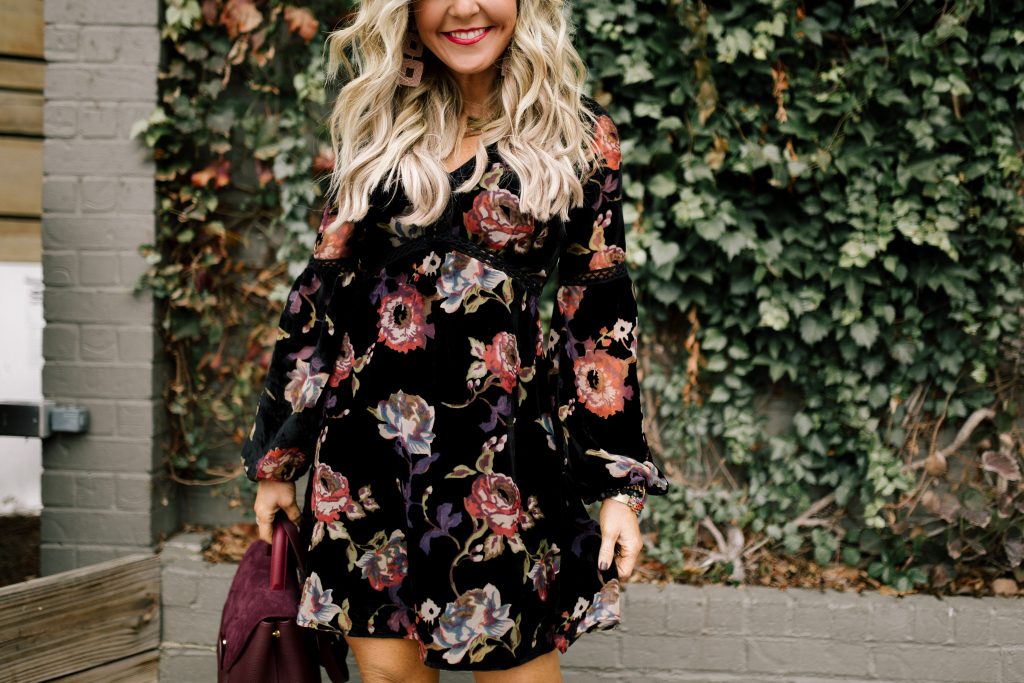 Cute Spring Dresses featured by top US fashion blog Hello! Happiness; Image of a woman wearing Francesca velvet dress, Vince Camuto booties, Polene satchel and Baublebar earrings.