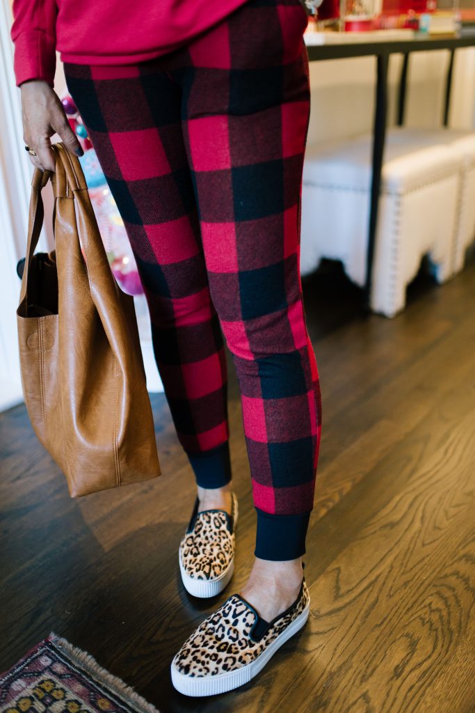 Top 10 of 2019 favorites + best sellers by popular life and style blog, Hello Happiness: image of a woman wearing Baylee leopard print sneakers. 