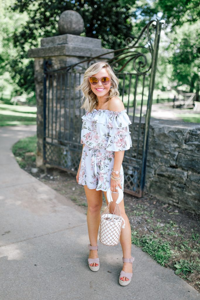 My Favorite Summer Ensembles... One and Done Wonders by popular Nashville fashion blog, Hello Happiness: image of a woman outside wearing a Jasper Off the Shoulder Romper and Audrina Sandals.