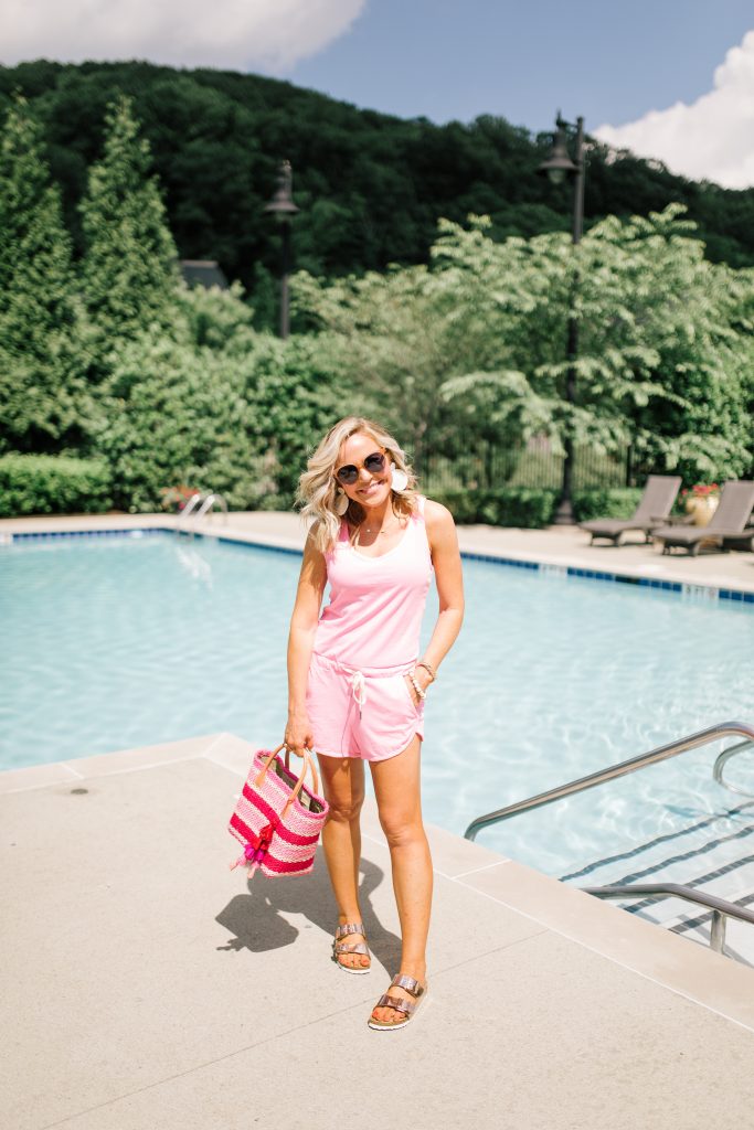 Evereve Summer Collection featured by top US fashion blog Hello! Happiness; Image of a woman wearing Evereve pink romper and Evereve rose gold sandals.