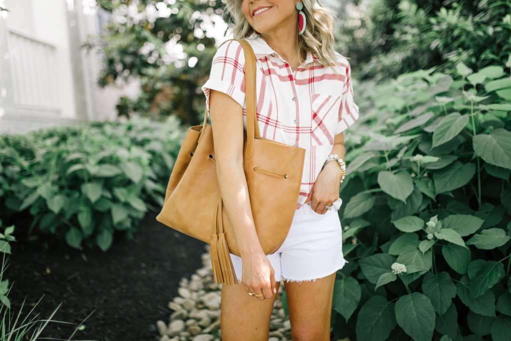 Evereve Summer Collection featured by top US fashion blog Hello! Happiness; Image of a woman wearing Evereve button up, Evereve shorts and Evereve rose gold sandals.