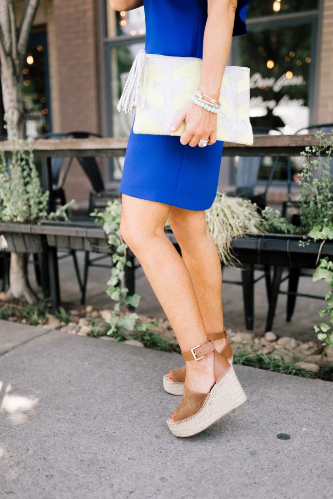 Blue Off the Shoulder Dress featured by top US fashion blog Hello! Happiness; Image of a woman wearing a Charles Henry dress, Marc Fisher wedges and Baublebar earrings.