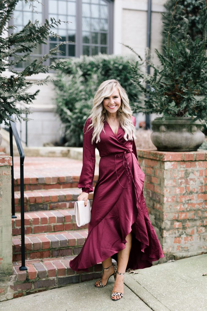 Cute Spring Dresses featured by top US fashion blog Hello! Happiness; Image of a woman wearing Shopbop berry dress, Shopbop leopard heels, Baublebar earrings and ABLE clutch.