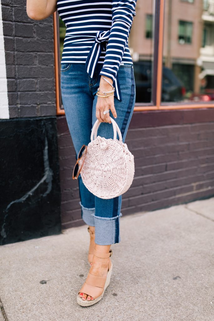 We Dress America featured by top US fashion blog Hello! Happiness; Image of a woman wearing a Walmart off the shoulder top, Walmart jeans, Walmart wedges and Walmart purse.