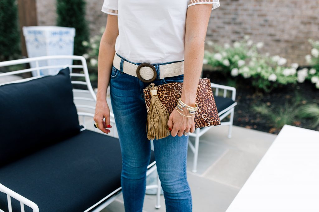 Snakeskin + Leopard...My Vince Camuto Favorites by popular Nashville blog, Hello Happiness: image of a woman outside wearing Vince Camuto  Kresseya High-Heel Sandals and holding a Vince Camuto Iggy Tassel Clutch.