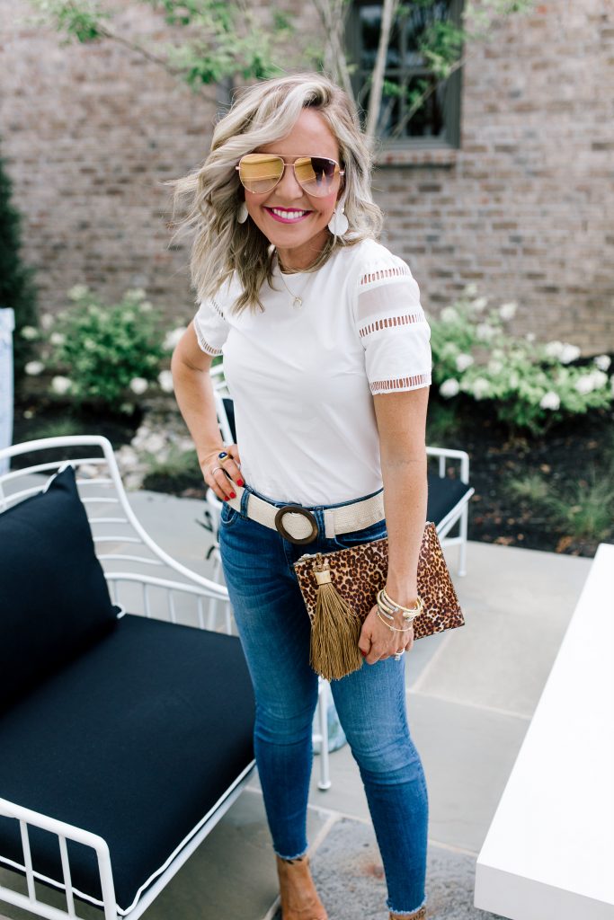 Snakeskin + Leopard...My Vince Camuto Favorites by popular Nashville blog, Hello Happiness: image of a woman outside wearing Vince Camuto  Kresseya High-Heel Sandals and holding a Vince Camuto Iggy Tassel Clutch.