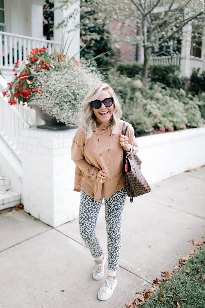 Shopbop Sale...The Biggest Event of the Season by popular Nashville fashion blog, Hello Happiness: image of a woman outside wearing Shopbop Z Supply The Multi Leopard Joggers, Z Supply THE AIRY SLUB LONG SLEEVE TOP, and Shopbop Le Specs Air Heart Sunglasses.