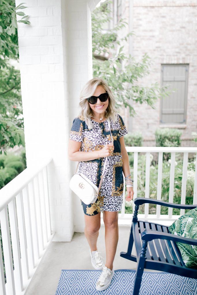 Shopbop Sale...The Biggest Event of the Season by popular Nashville fashion blog, Hello Happiness: image of a woman outside wearing a Shopbop MINKPINK Material Girl T-Shirt Dress. 
