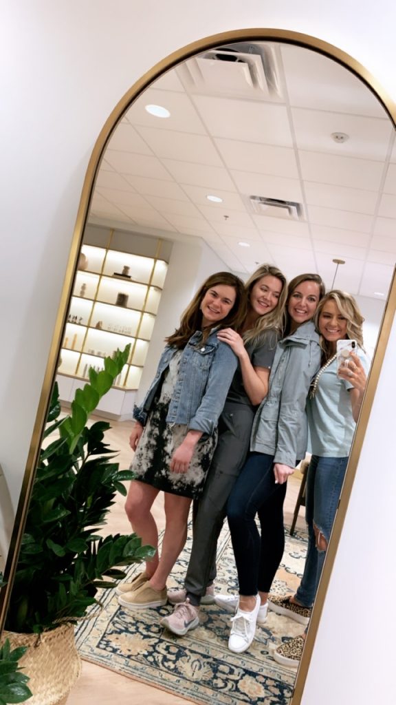 Lip Service... An Updated Q&A with Maegan and Skin Pharm by popular Nashville blog, Hello Happiness: image of four women taking a selfie in a full length mirror inside the Skin Pharm lobby.
