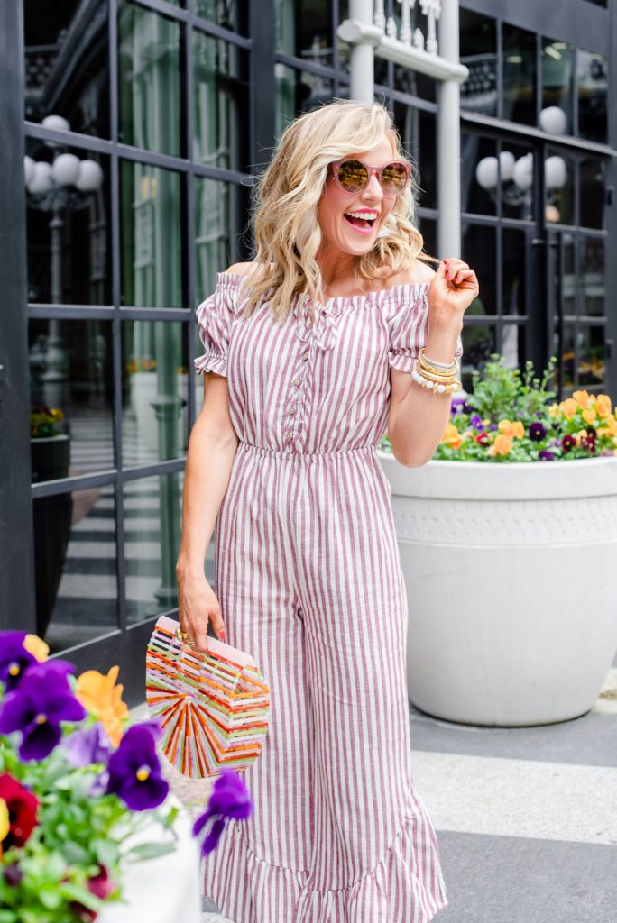 RewardStyle Conference featured by top US fashion blog Hello! Happiness; Image of a woman wearing Free People jumpsuit, Diff sunglasses, See by Chloe wedges and Katie Kime earrings.