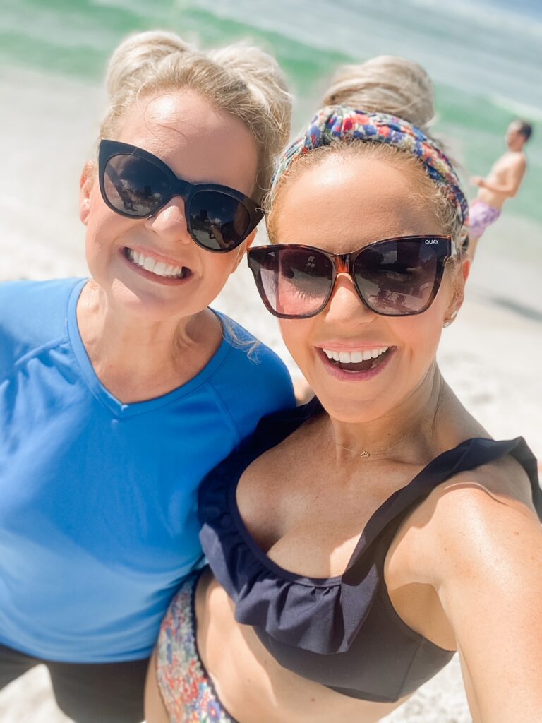 Rosemary Beach by popular Nashville travel blog, Hello Happiness: image of Natasha Stoneking standing with her mom on the beach. 