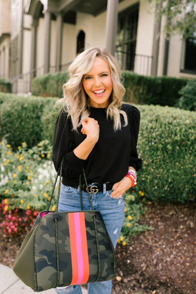 Year in Review by popular Nashville lifestyle blog, Hello Happiness: image of Natasha Stoneking holding a Social Thread bag. 