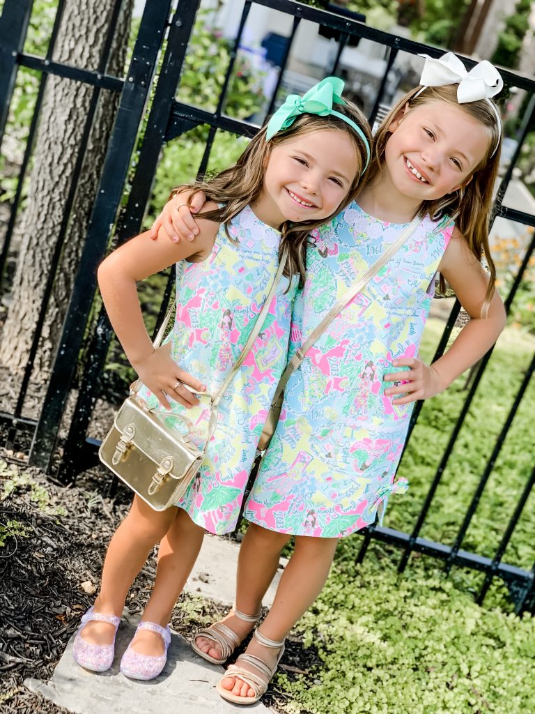 The Lilly Pulitzer After Party Sale is LIVE! by popular Nashville fashion blog, Hello Happiness: image of two girls standing next to each other and wearing a Lilly Pulitzer  Classic Little Lilly Shift Dress.