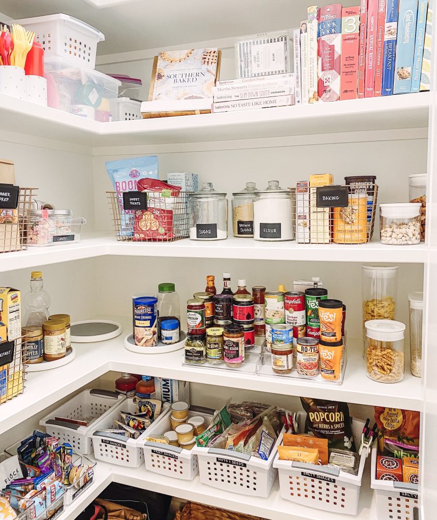Kitchen Pantry Organization by popular Nashville life and style blog, Hello Happiness: image of a pantry organized with baskets from The Container Store. 