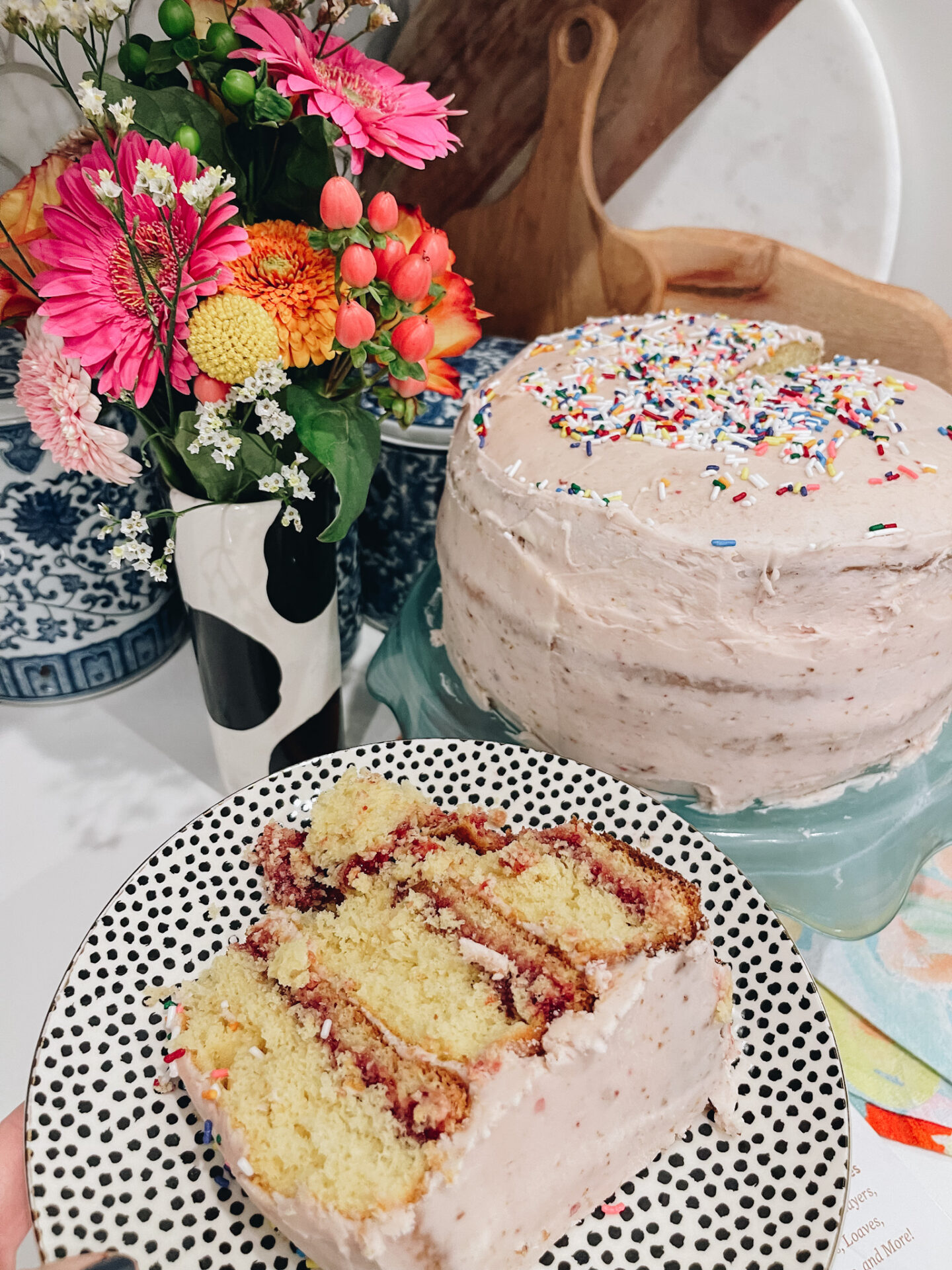 vanilla cake with cherry buttercream recipe featured by Nashville lifestyle blogger, Hello Happiness