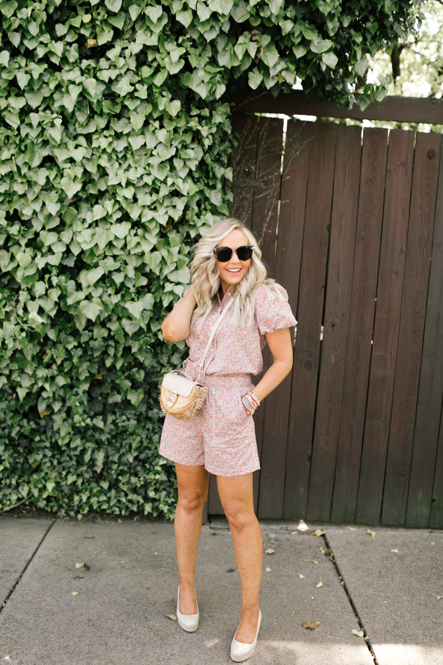 J Crew Clothing by popular Nashville fashion blog, Hello Happiness: image of a woman wearing a J Crew classic fit short sleeve blouse and pull-on camp shorts in Eloise liberty of London print. 