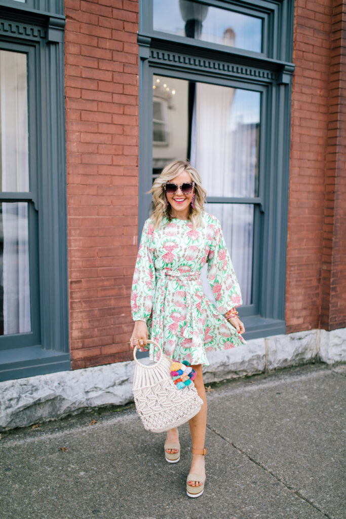 Mother's Day Gift Ideas by popular Nashville life and style blog, Hello Happiness: image of a woman wearing a Emily McCarthy PARTY SWING DRESS, Hat Attack Cotton Cord Bag, Amazon LITOON Tassel Pom Pom Key Chain, See by Chloe Glyn Platform Espadrilles, and Lisi Lerch NATALIE earrings. 