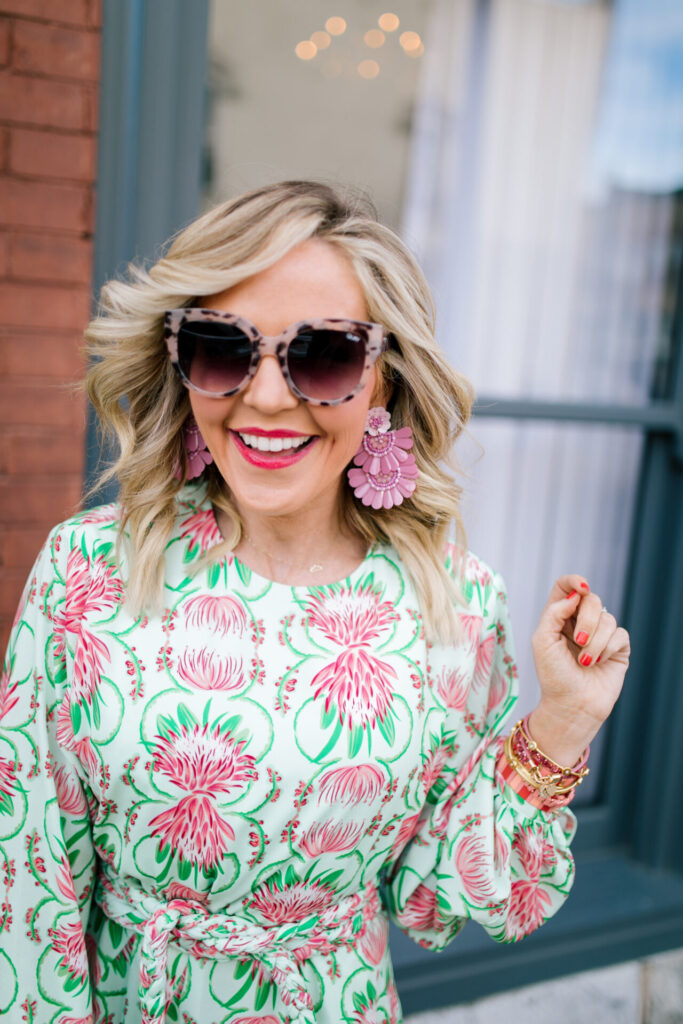 Independence Day Deals by popular Nashville life and style blog, Hello Happiness: image of Natasha Stoneking wearing Lisi Lerch Natalie earrings and a Emily McCarthy PARTY SWING DRESS - PROPER PROTEA.  