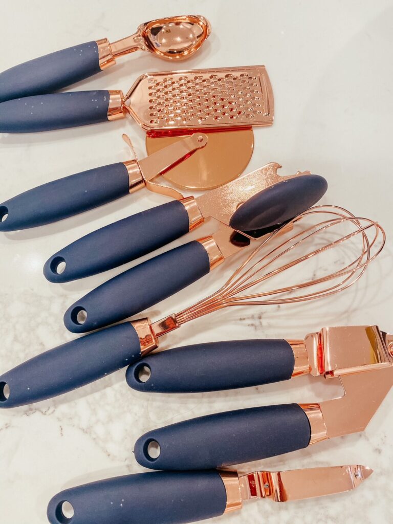 Amazon Favorites by popular Nashville life and style blog, Hello Happiness: image of a Amazon navy and copper kitchen utensil set. 