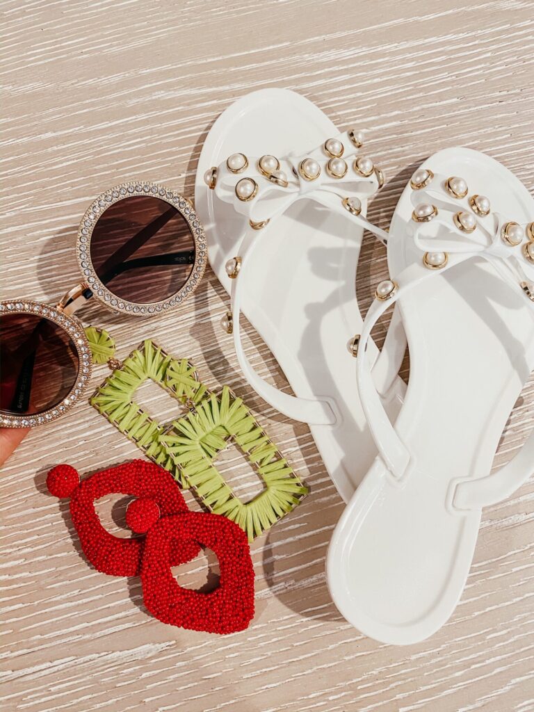 Amazon Favorites by popular Nasvhille life and style blog, Hello Happiness: image of some Amazon SOJOS Round Oversized Rhinestone Sunglasses, Amazon LIXIN YIQING 14K Gold Statement Drop Earrings For Women, Amazon green raffia earrings, and Amazon Mtzyoa Women Flip-Flops Pearls Bow Sandals.