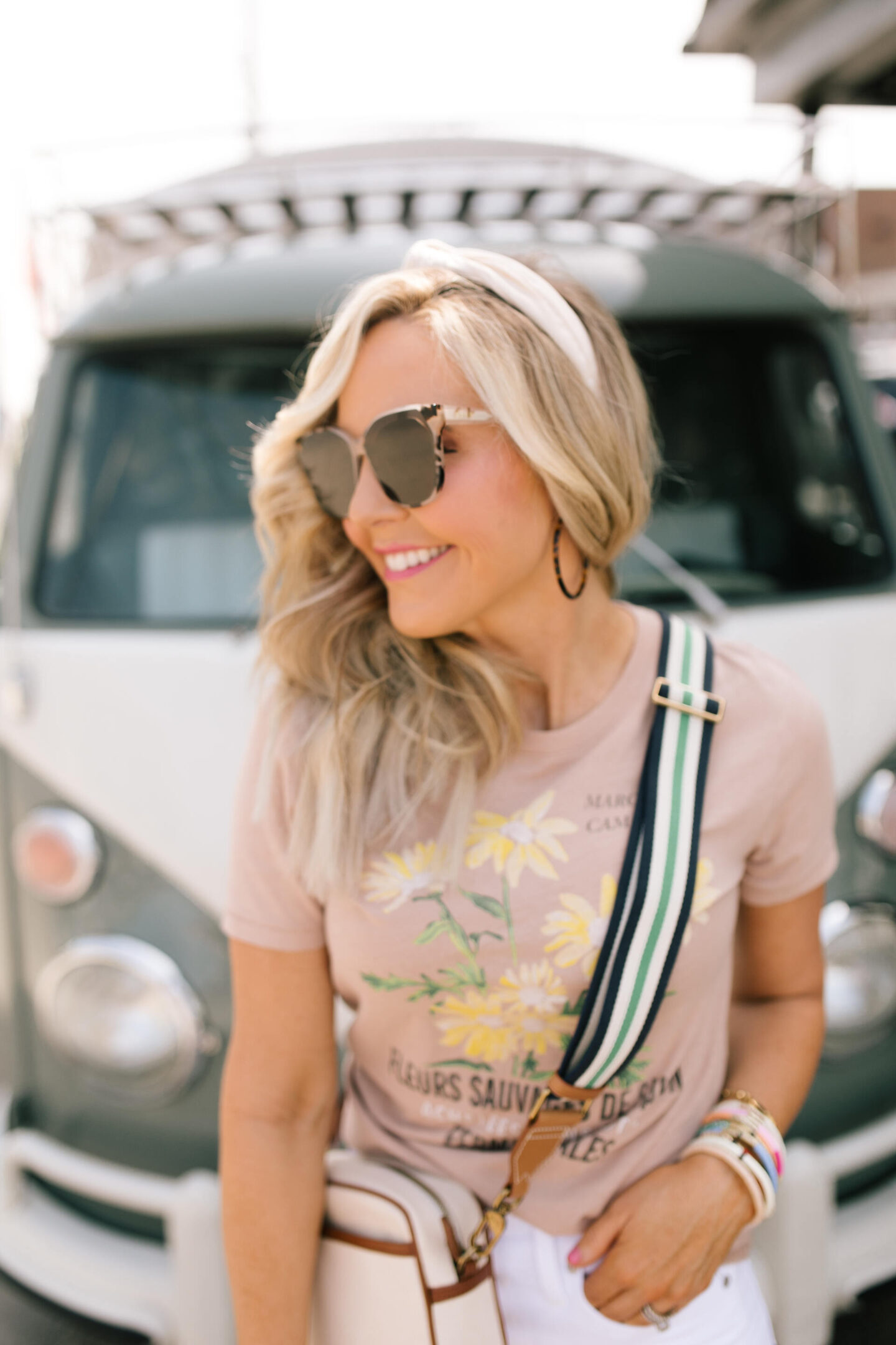 4th of July Deals by popular Nashville life and style blog, Hello Happiness: image of Natasha Stoneking wearing a J. Crew floral tee. 