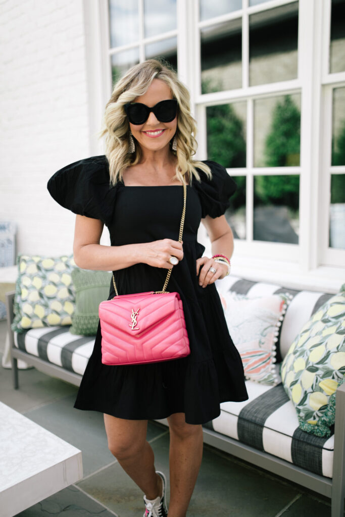 Pink Bags by popular Nashville fashion blog, Hello Happiness: image of Natasha Stoneking wearing a black puff sleeve dress, black sunglasses, Steve Madden RUBIE NATURAL MULTI, and holding a Yves Saint Laurent LOULOU SMALL IN MATELASSÉ “Y” LEATHER.