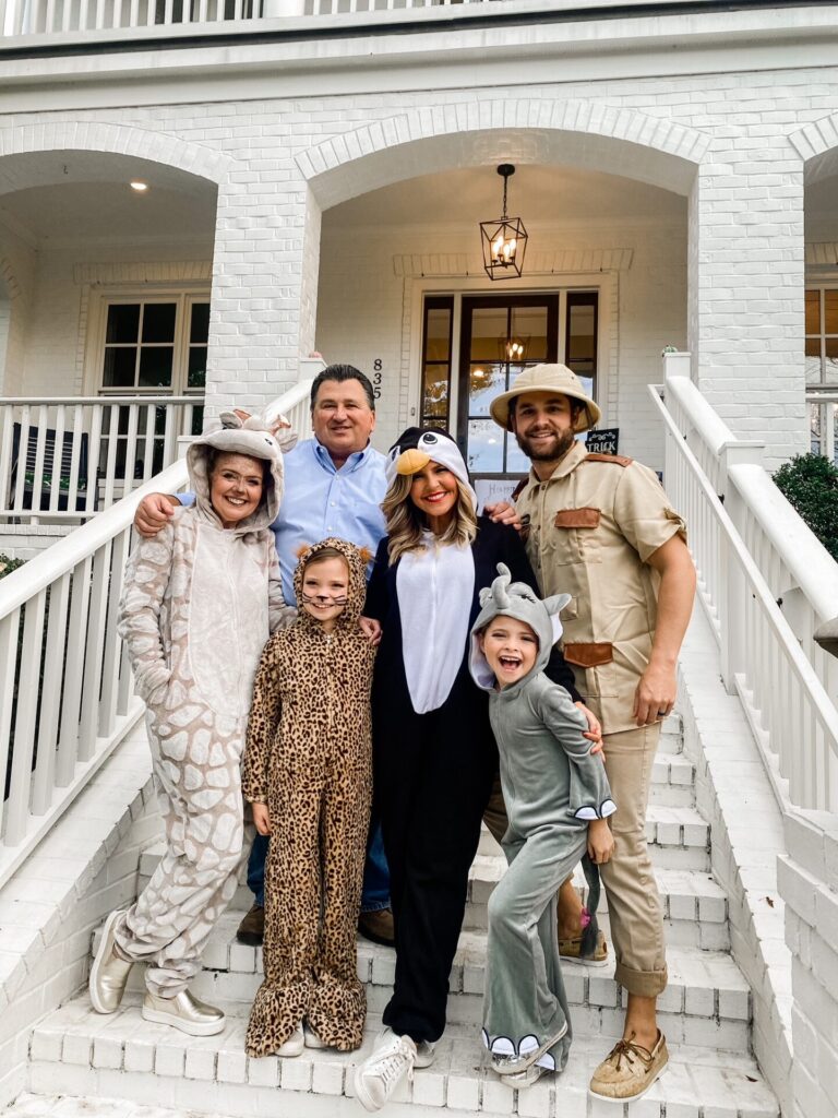 Year in Review by popular Nashville lifestyle blog, Hello Happiness: image of a group family standing together outside and wearing animal costumes. 