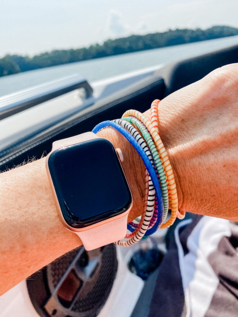 Amazon Favorites by popular Nashville fashion blog, Hello Happiness: image of Natasha Stoneking wearing a Apple Watch and some Amazon 10 Assorted Color Recycled Flip Flop Bracelets Hand Made in Mali, West Africa.