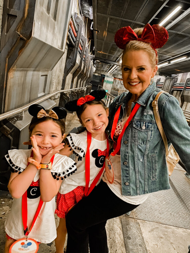 Disney Creators Celebration by poplar Nashville travel blog, Hello Happiness: image of a grandma and her two granddaughters on the Disney Avatar ride.