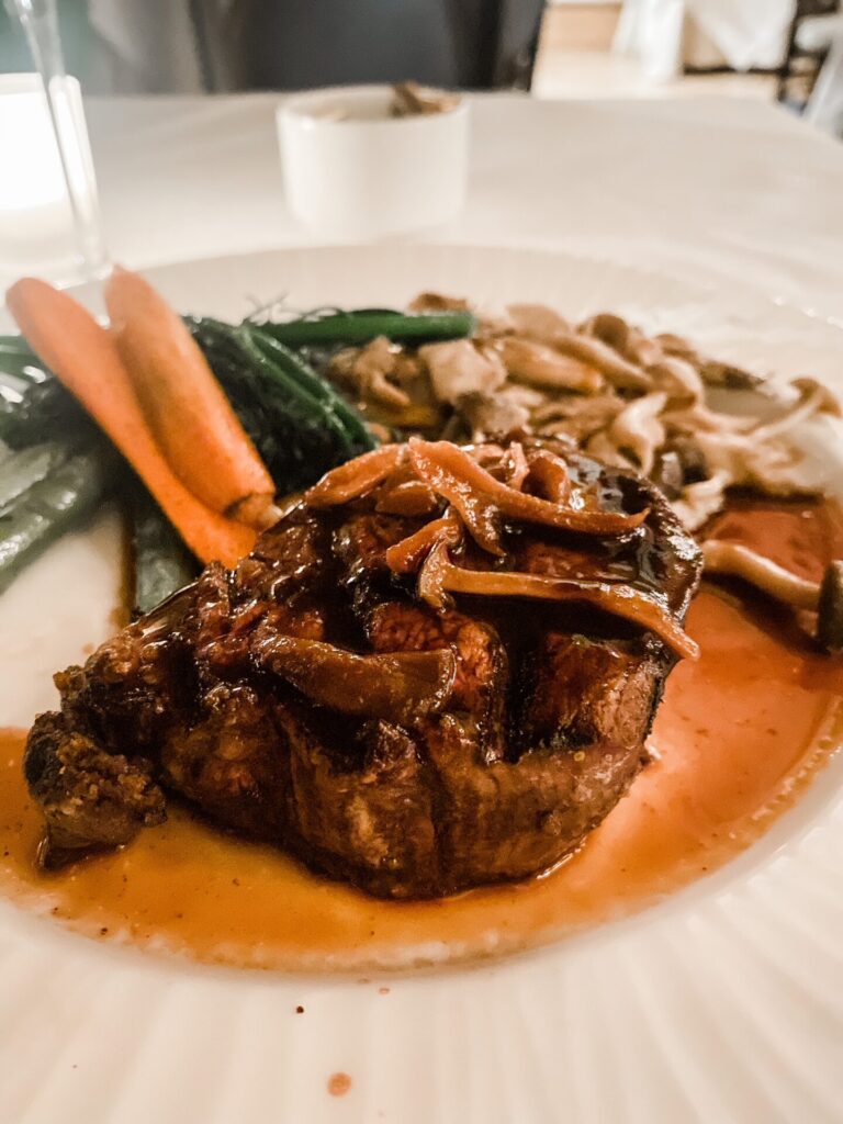 Hotel Crescent Court Dallas by popular Nashville travel blog, Hello Happiness: image of steak, green beans, and mushrooms. 