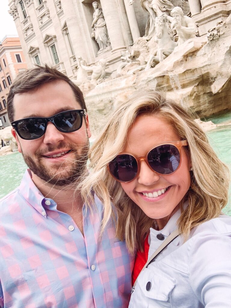 Personal Questions by popular Nashville lifestyle blog, Hello Happiness: image of Natasha Stoneking and her husband standing together in front of the Tripoli fountain in Rome, Italy. 