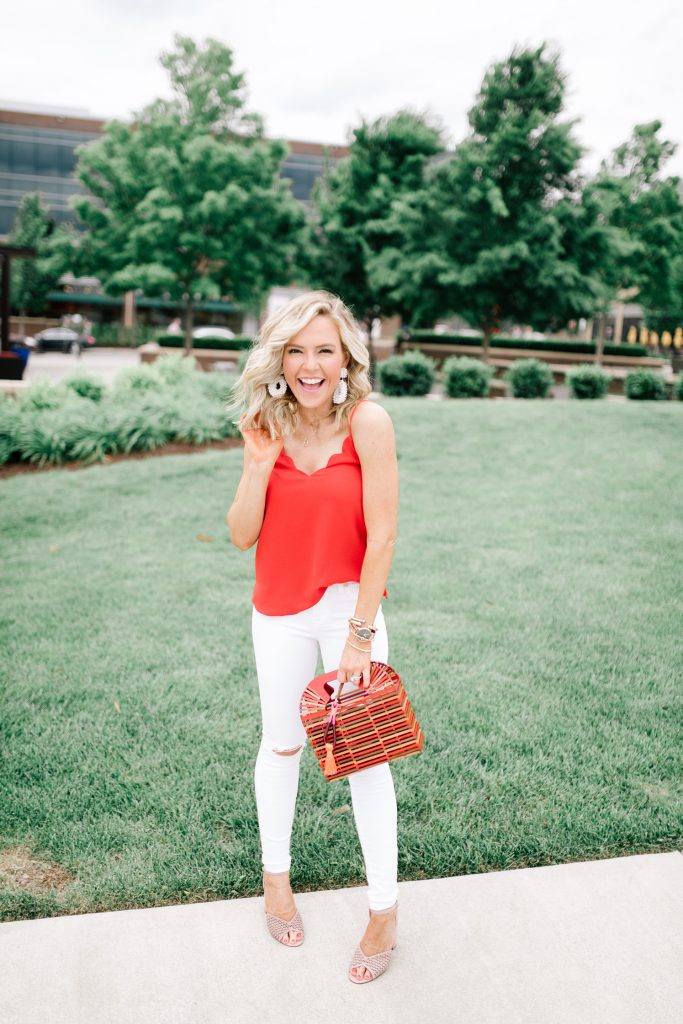 Vince Camuto Accessories featured by top US fashion blog Hello! Happiness; Image of a woman wearing Evereve top, white denim, Vince Camuto shoes and a Vince Camuto purse.