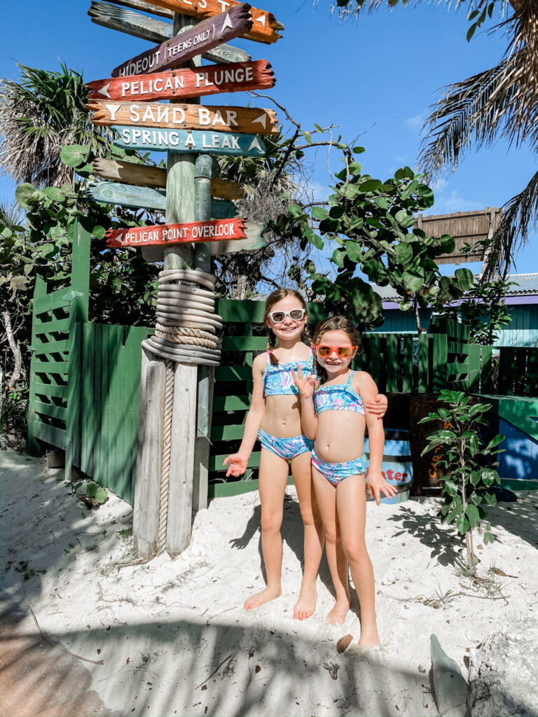 Disney Creators Celebration by popular Nashville lifestyle blog, Hello Happiness: image of two girls standing together and wearing matching UPF 50+ Girls Caia Bikinis. 