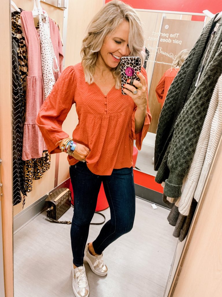 The Friday Five...by popular Nashville life and style blog, Hello Happiness: image of a woman trying on a Target Women's Long Sleeve V-Neck Peasant Top.