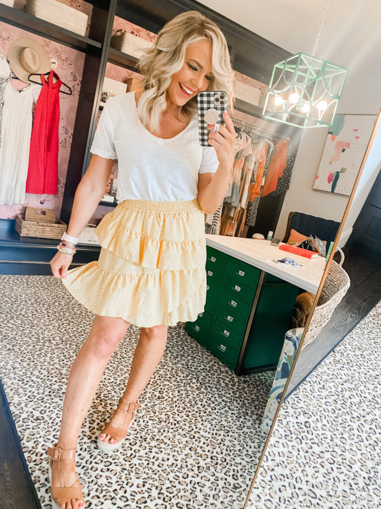 Amazon Favorites by popular Nashville fashion blog, Hello Happiness: image of Natasha Stoneking wearing a Amazon tiered yellow polka dot skirt. 