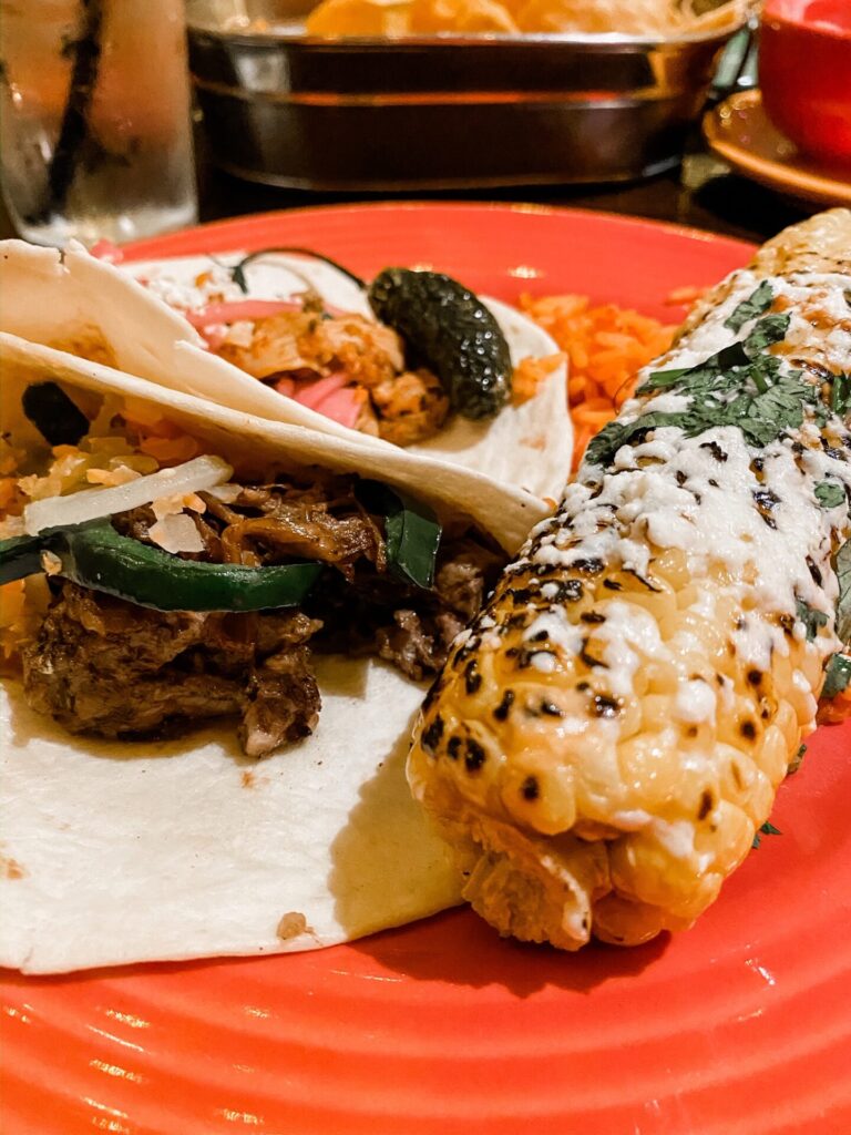 Gaylord Soundwaves by popular Nashville lifestyle blog, Hello Happiness: image of a plate of tacos and grilled corn. 