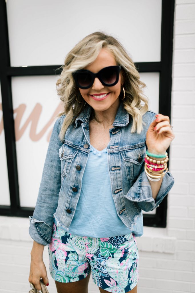 Hip Hip Hooray... The Lilly After Party Sale is Here! by popular Nashville fashion blog, Hello Happiness: image of a woman wearing a Lilly Pulitzer Etta Pom-Pom top and Lilly Pulitzer Malie stretch shorts. 