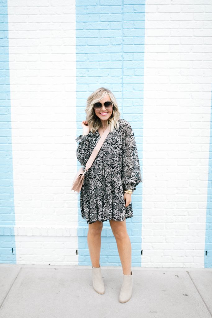 Say Hello to the Vici Collection in 2020! by popular Nashville fashion blog, Hello Happiness: image of a woman wearing a Vici GONNA BE FOREVER RUFFLE TIERED DRESS, Vici HERMIONE FAUX LEATHER CROSSBODY BAG, and Vici ACCOMPANY HEELED BOOTIE - TAUPE.