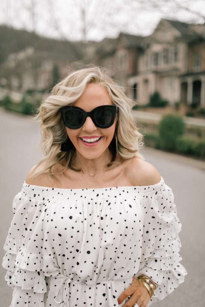 Vici Collection Polka Dot Dress by popular Nashville fashion blog, Hello Happiness: image of a woman wearing a Vici ENCHANTED OFF THE SHOULDER POLKA DOT DRESS.