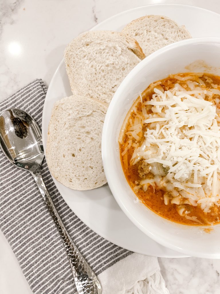 Weeknight Meals by popular Nashville lifestyle blog, Hello Happiness: image of lasagna soup in a white ceramic bowl. 