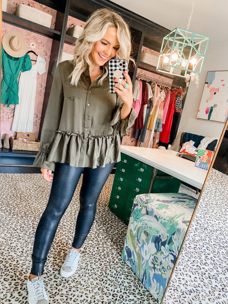Amazon Favorites by popular Nashville life and style blog, Hello Happiness: image of a woman wearing a Amazon long sleeve ruffle blouse and spanx faux leather leggings. 