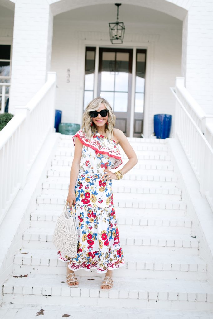 Let's Getaway... The Gibson Resort x Hi Sugarplum Collection is Here! by popular Nashville fashion blog, Hello Happiness: image of a woman wearing a Hi Sugarplum  Portofino Tiered Midi Skirt, Amazon Aphoraeny Womens Rivets Flat Sandals, Amazon boderier Beaded Drop Earrings, and ShopBop Hat Attack Cotton Cord Bag.